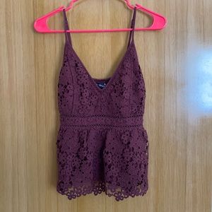 Wine colored A&F medium top.